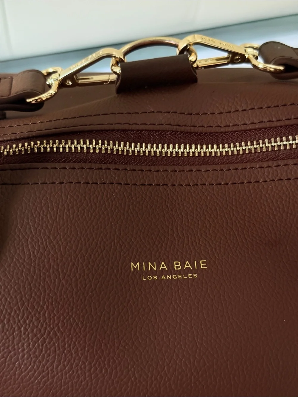 Mina Baie sleek brown